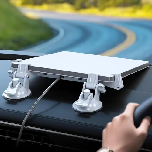Starlink Mini montado con ventosas en el dashboard de un auto